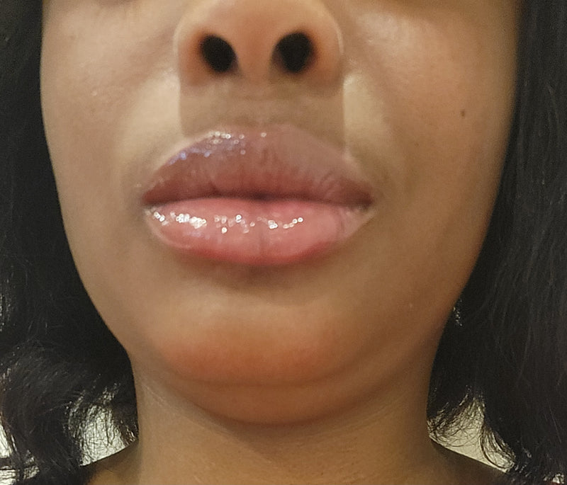 After - Fuller, glossier lips after applying Coco Lip Plumper. See the difference!
